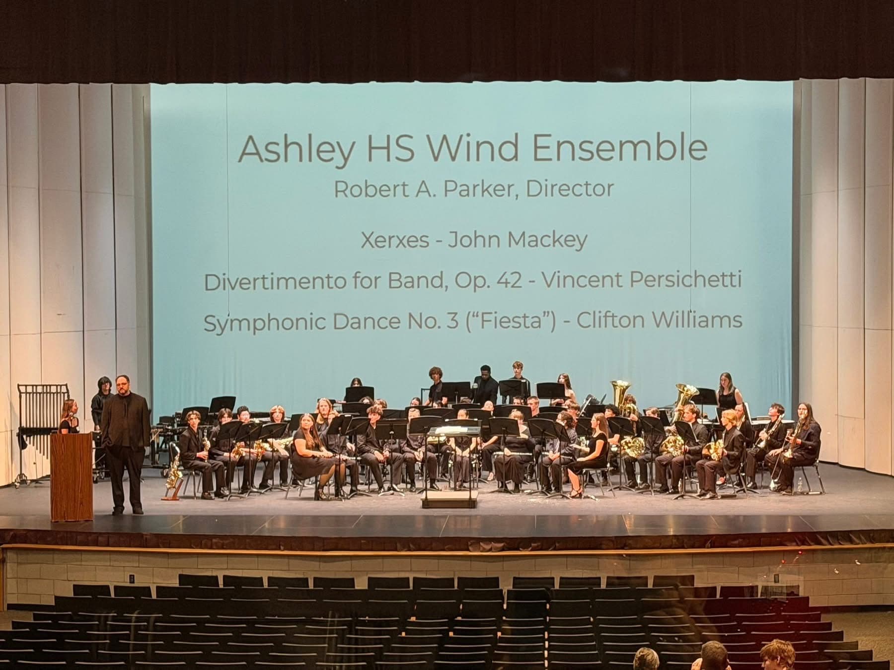 Ashley High School Wind Ensemble performing on stage